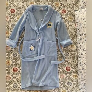 Light blue kid’s bathrobe with pockets and belt